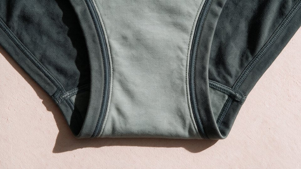 Inside view of the shaped sage gusset between the briefs' leg openings